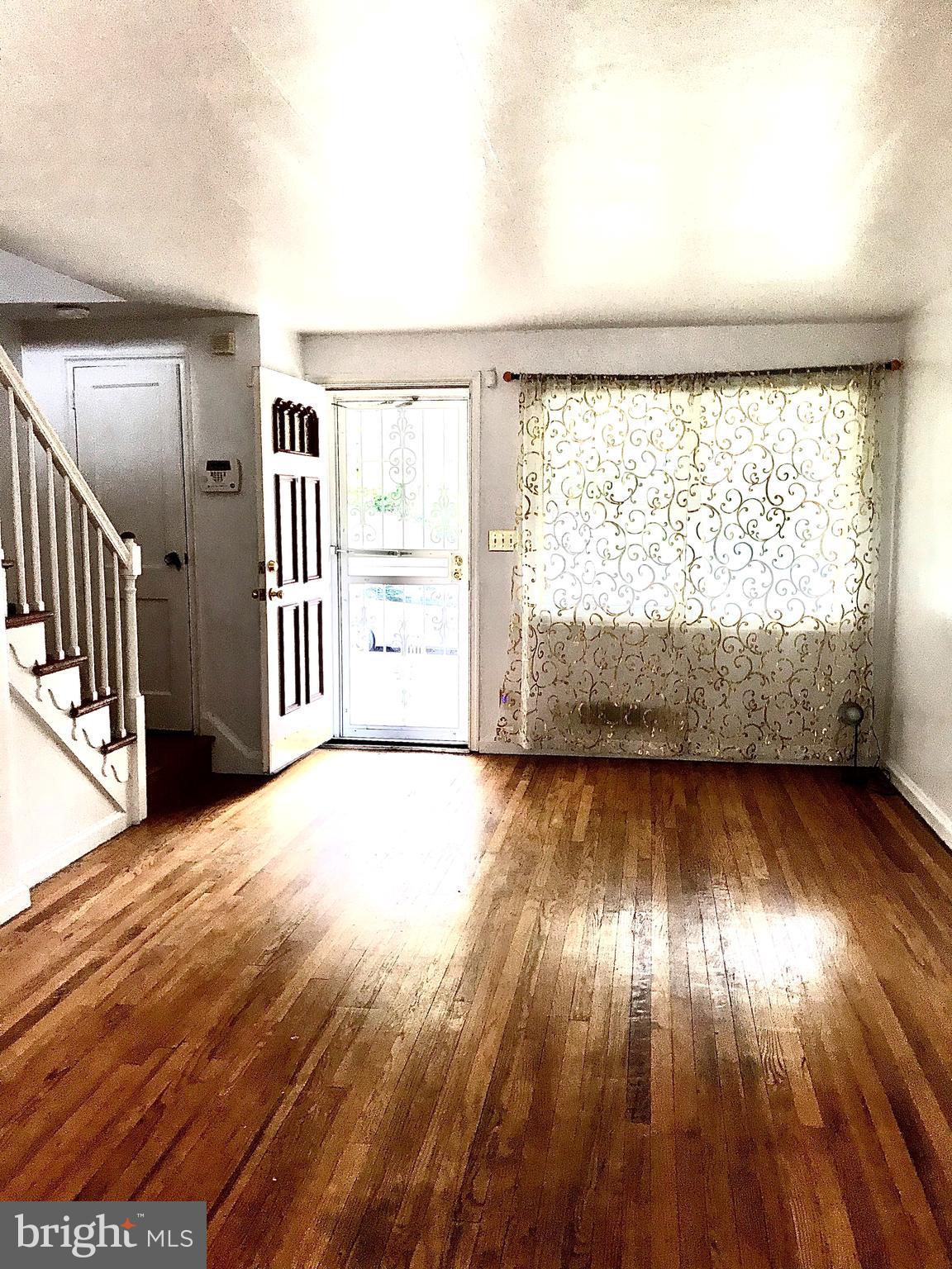 1131 Wedgewood Road Baltimore, MD 21229 - Photo 14 of 79 Glistening wood floors throughout
