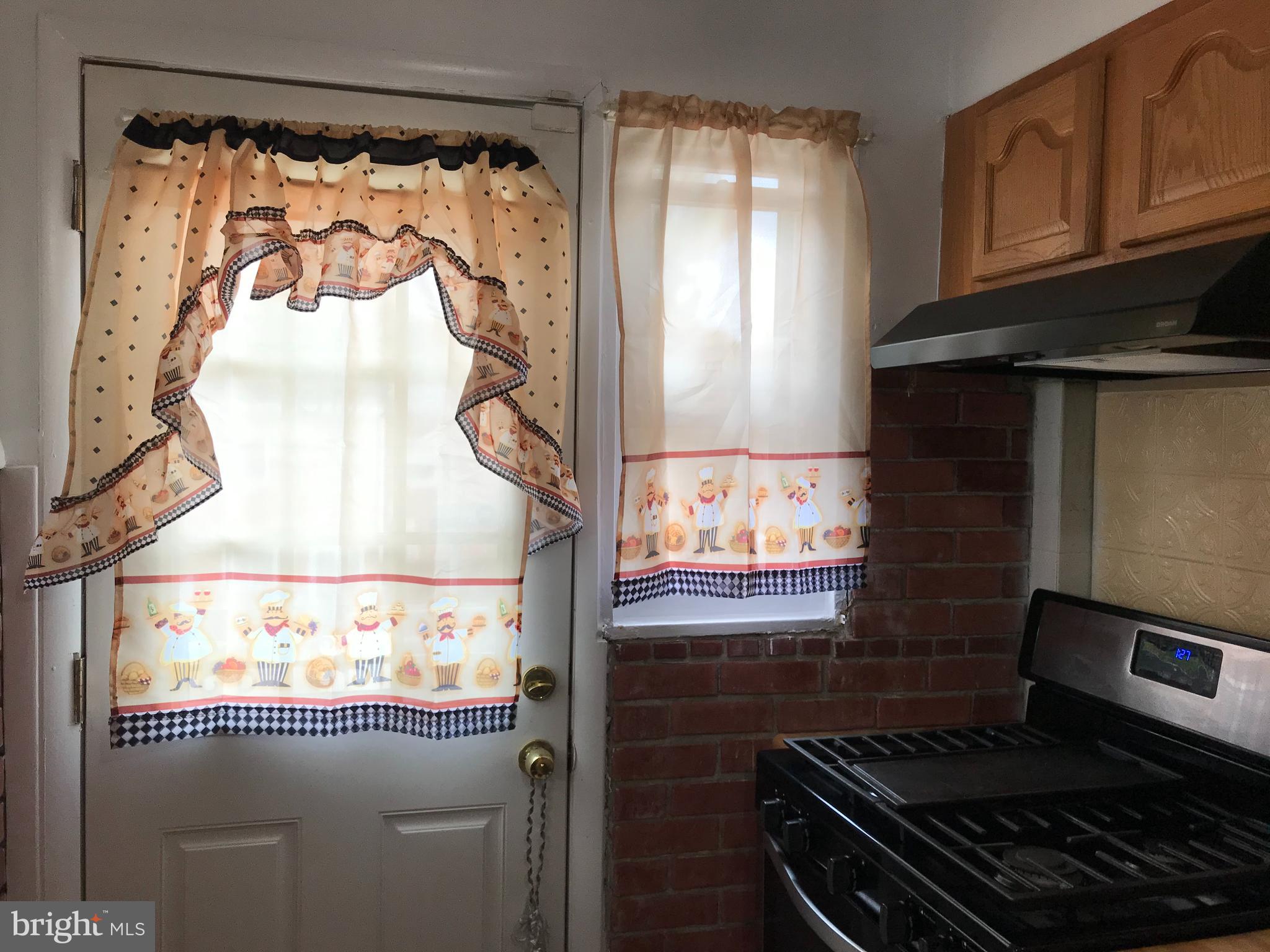 1131 Wedgewood Road Baltimore, MD 21229 - Photo 27 of 79 Back door in kitchen leads to balcony