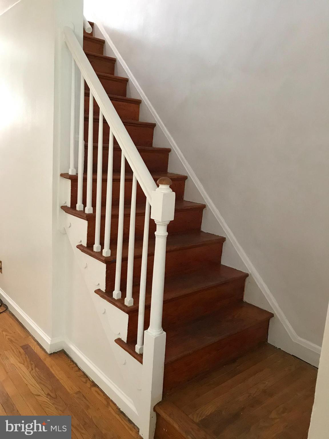 1131 Wedgewood Road Baltimore, MD 21229 - Photo 39 of 79 Shiny wood floors on staircase