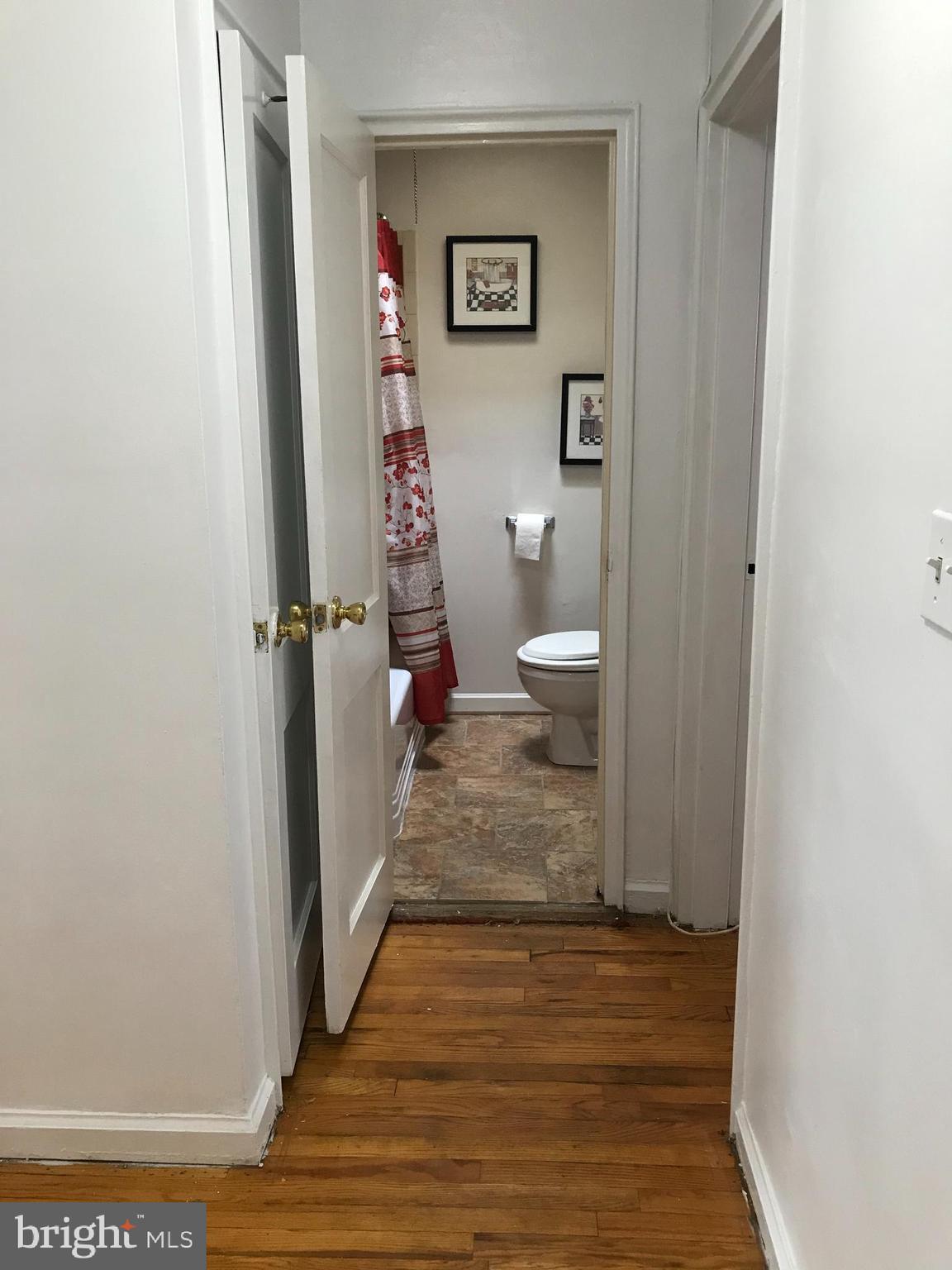 1131 Wedgewood Road Baltimore, MD 21229 - Photo 45 of 79 Peak into the bathroom