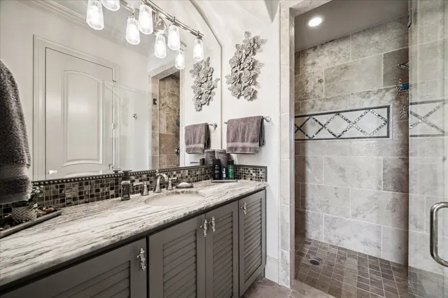 a living room with furniture wooden floor and a chandelier