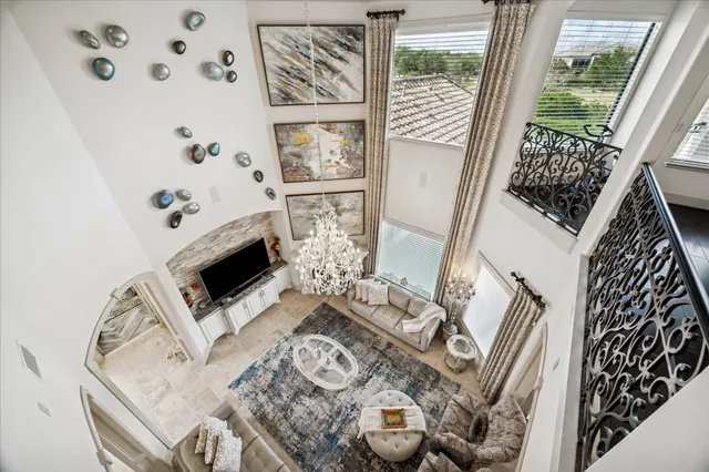 a view of a hallway with living room and dining room view