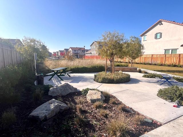 a view of a street with a building in the background