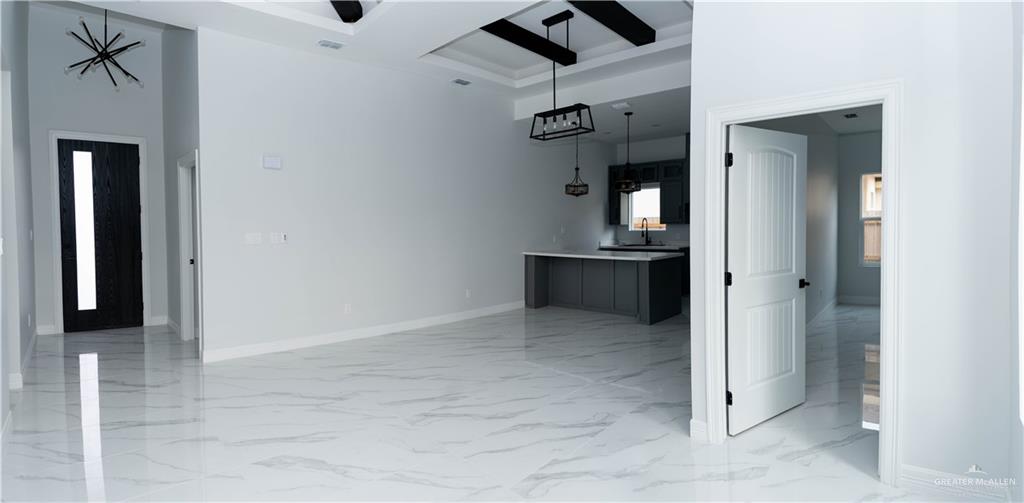 512 Spring Drive Alton, TX 78573 - Photo 12 of 18 an empty room with closet and windows