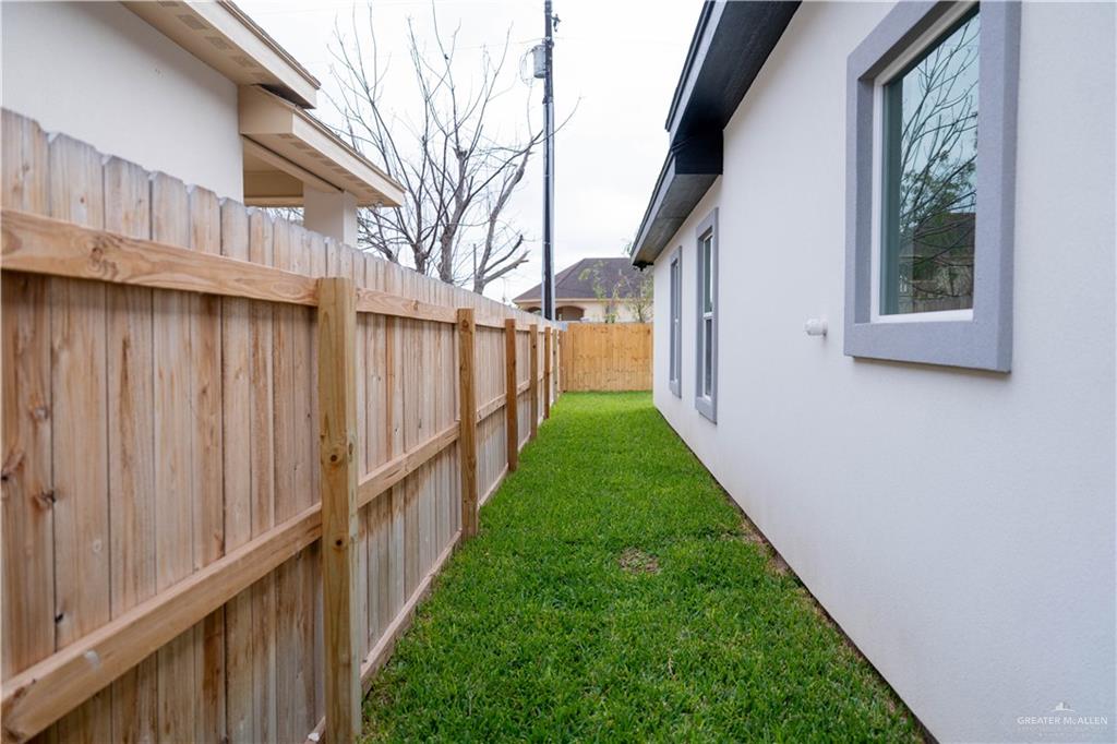 512 Spring Drive Alton, TX 78573 - Photo 16 of 18 a view of a house with brick walls