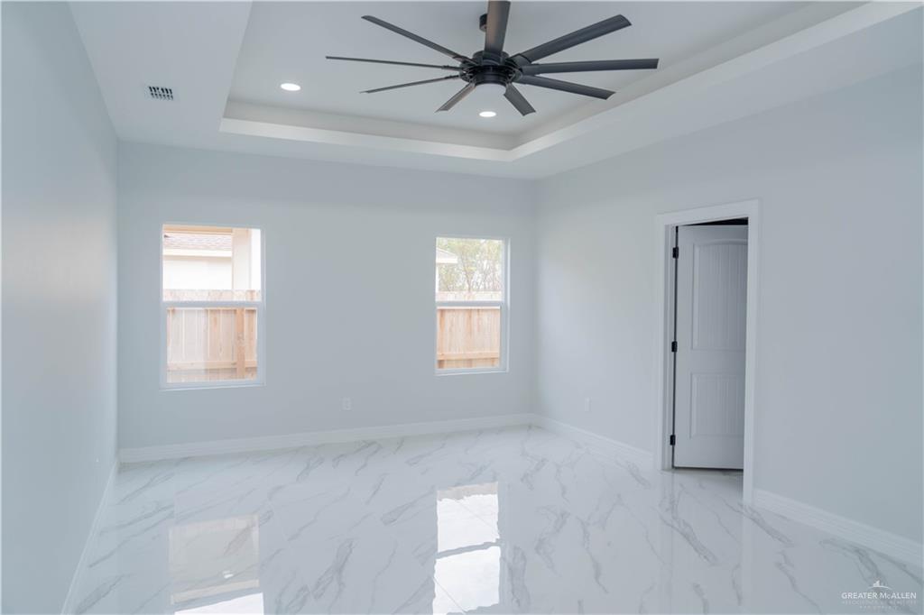 512 Spring Drive Alton, TX 78573 - Photo 7 of 18 a view of an empty room with a window