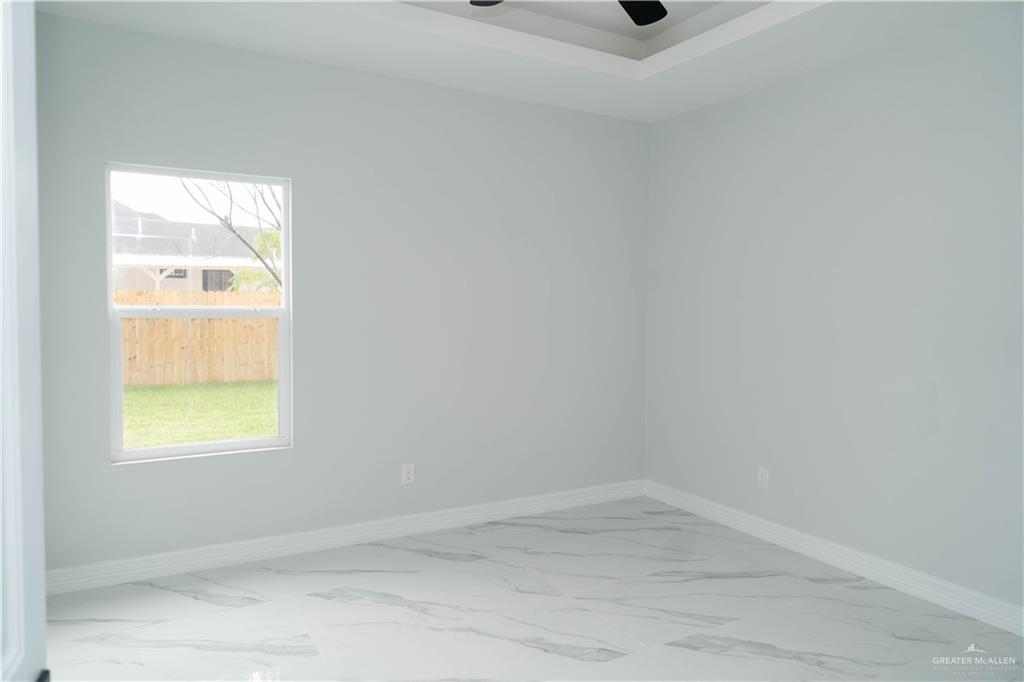 512 Spring Drive Alton, TX 78573 - Photo 9 of 18 a view of an empty room and window