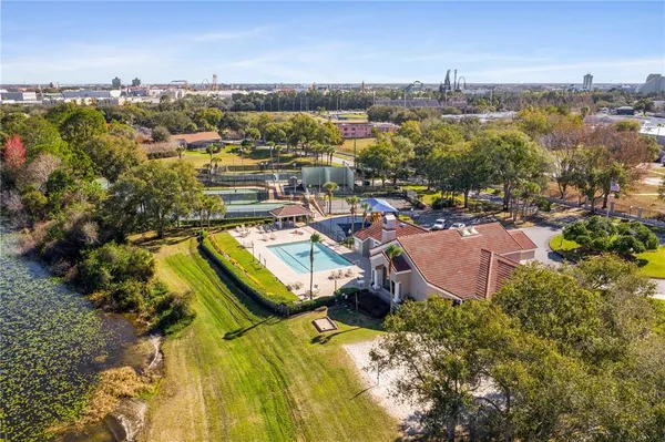 an aerial view of a house with a lake view