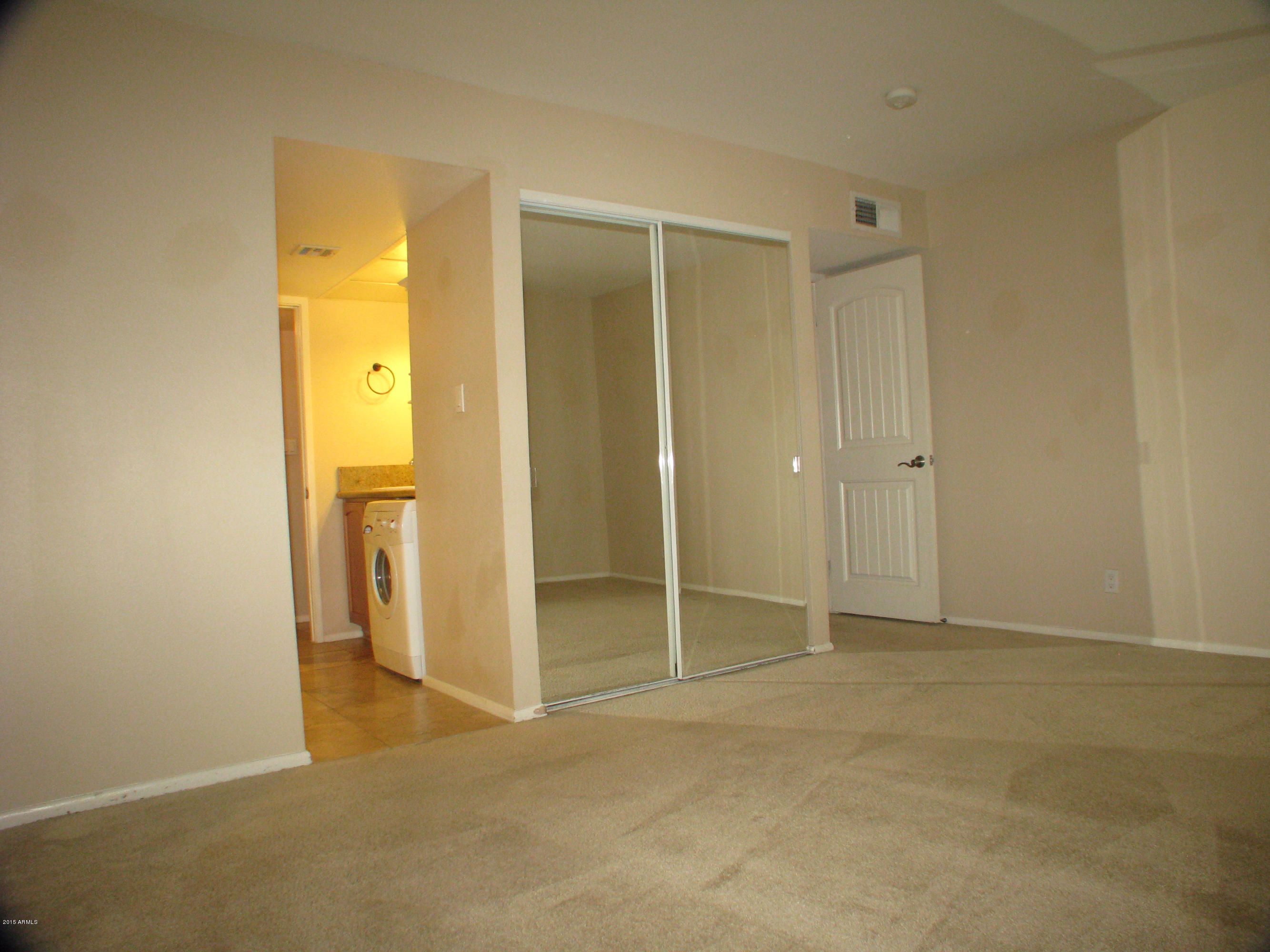 3807 North 30th Street, Unit 8 Phoenix, AZ 85016 - Photo 16 of 24 an empty room with closet area