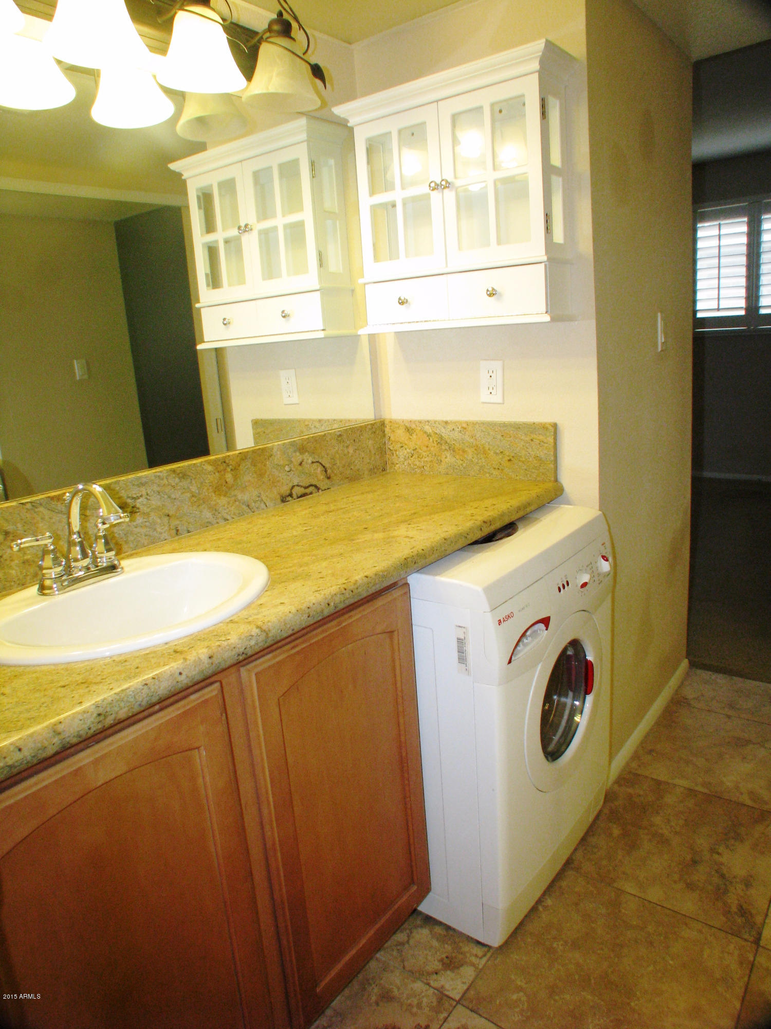 3807 North 30th Street, Unit 8 Phoenix, AZ 85016 - Photo 17 of 24 a utility room with dryer and washer