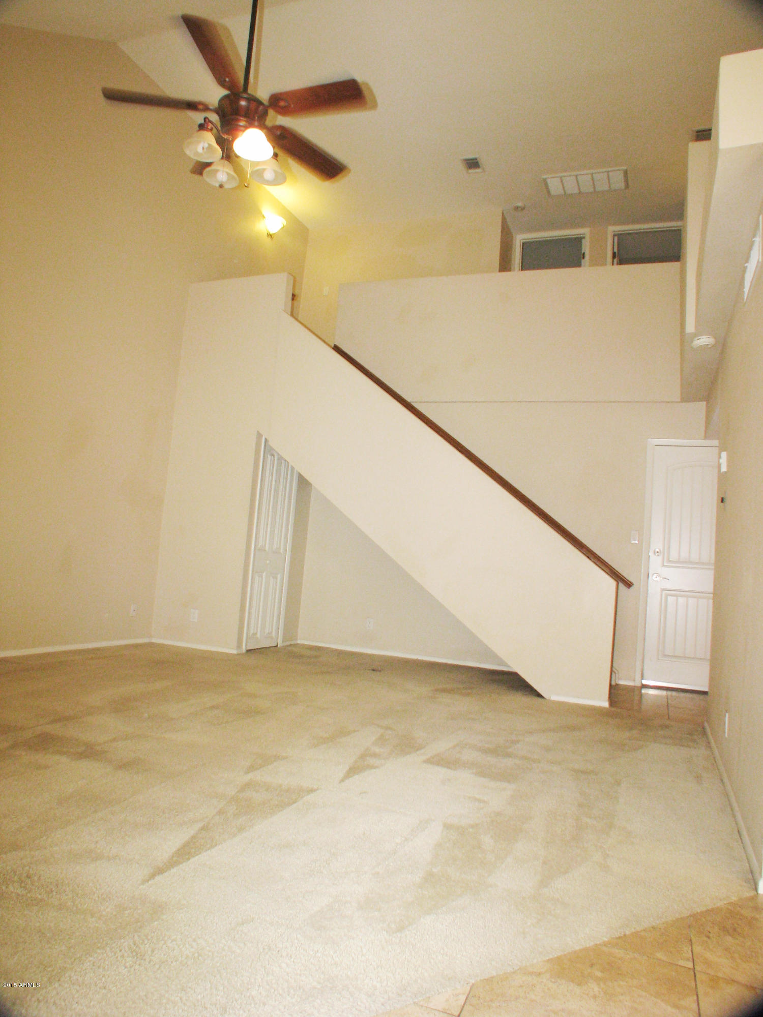 3807 North 30th Street, Unit 8 Phoenix, AZ 85016 - Photo 3 of 24 a view of a big room with ceiling fan