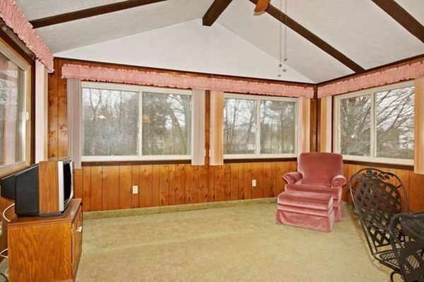 4 Thistle Road Woburn, MA 01801 - Photo 13 of 24 a couch sitting in front of a window