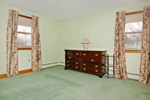 4 Thistle Road Woburn, MA 01801 - Photo 15 of 24 a room with a bed and a window