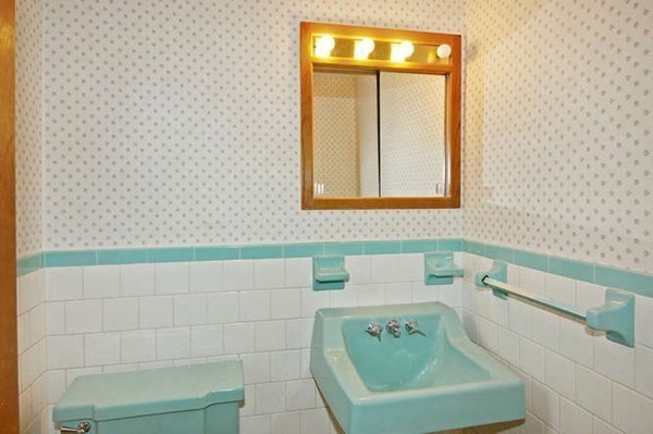 4 Thistle Road Woburn, MA 01801 - Photo 16 of 24 a bathroom with a sink and a mirror