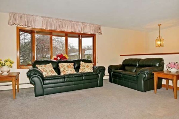 4 Thistle Road Woburn, MA 01801 - Photo 7 of 24 a living room with furniture and a large window