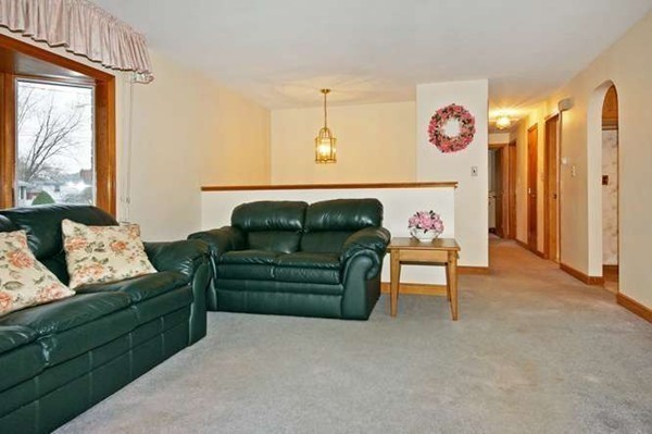 4 Thistle Road Woburn, MA 01801 - Photo 9 of 24 a living room with furniture and a window