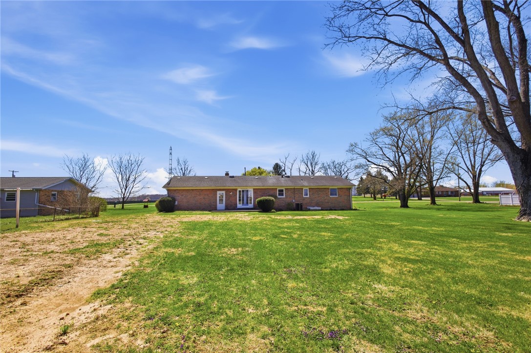 6718 Old Columbus Road South Vienna, OH 45369 - Photo 29 of 33 This spacious property features a charming brick home with just under 1 acre of lawn, ideal for outdoor enjoyment.
