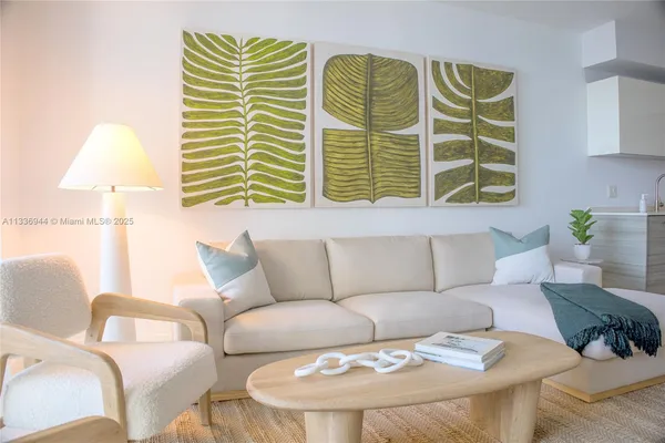 a living room with furniture and a window