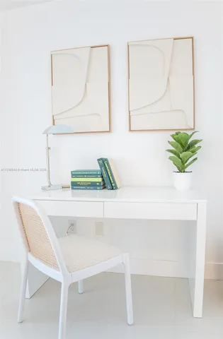 a view of a room with a sink and a potted plant