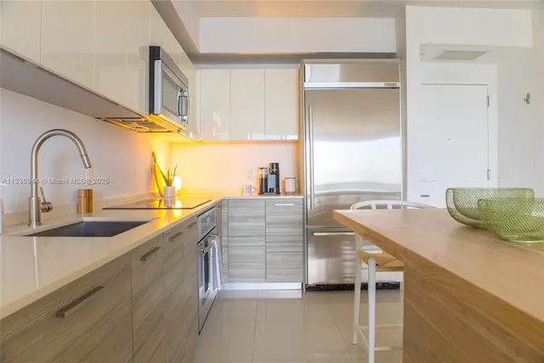 a view of a kitchen from a kitchen