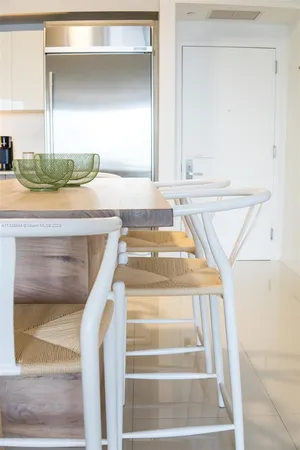 a view of staircase with white walls