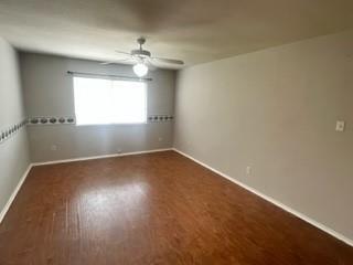 415 Colony Drive Allen, TX 75013 - Photo 12 of 14 an empty room with wooden floor and windows