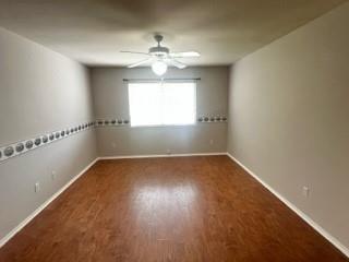 415 Colony Drive Allen, TX 75013 - Photo 10 of 14 an empty room with wooden floor and windows