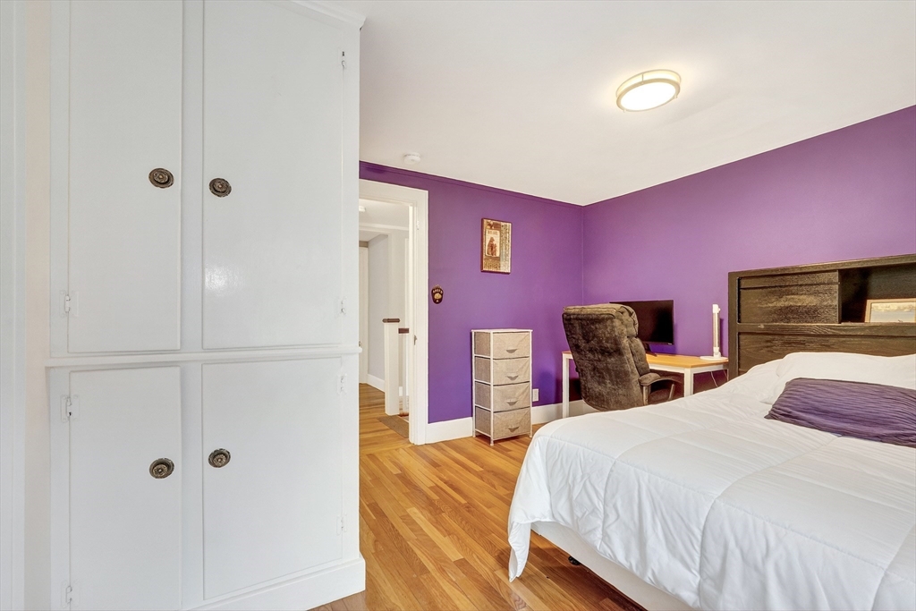 87 Payson Road Brookline, MA 02467 - Photo 20 of 41 a bedroom with a bed and a closet