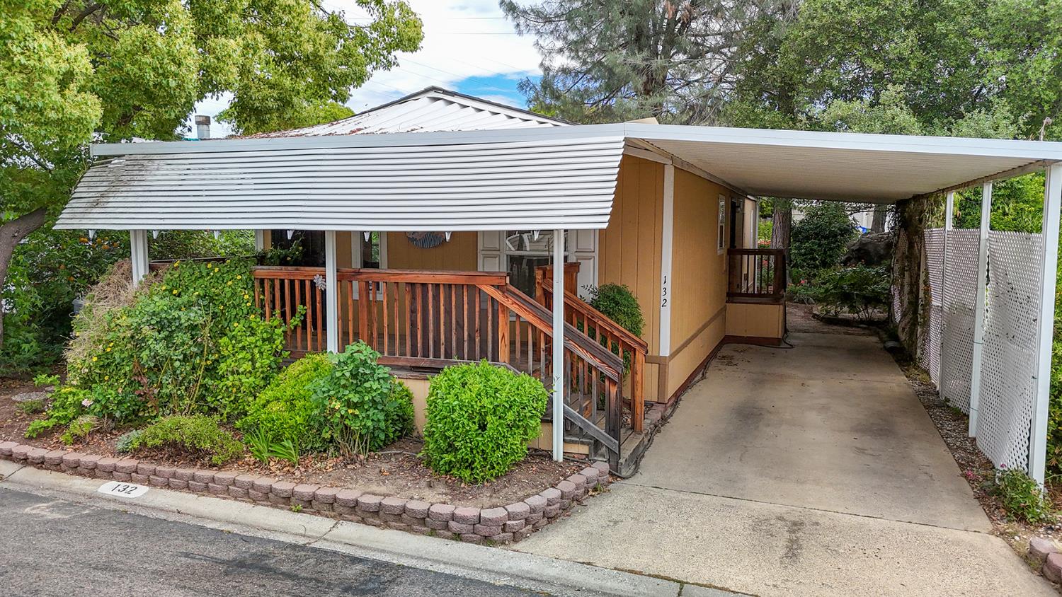 132 Danielle Way Folsom, CA 95630 - Photo 2 of 52 a view of a house with a small yard plants and large tree