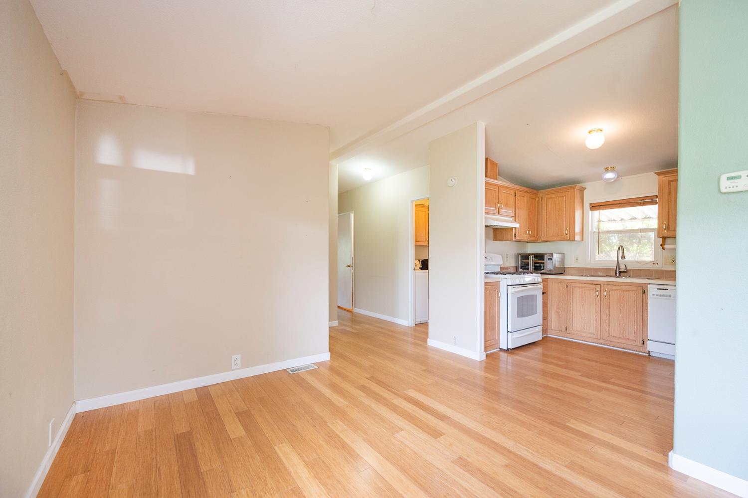 132 Danielle Way Folsom, CA 95630 - Photo 22 of 52 a view of a kitchen with wooden floor