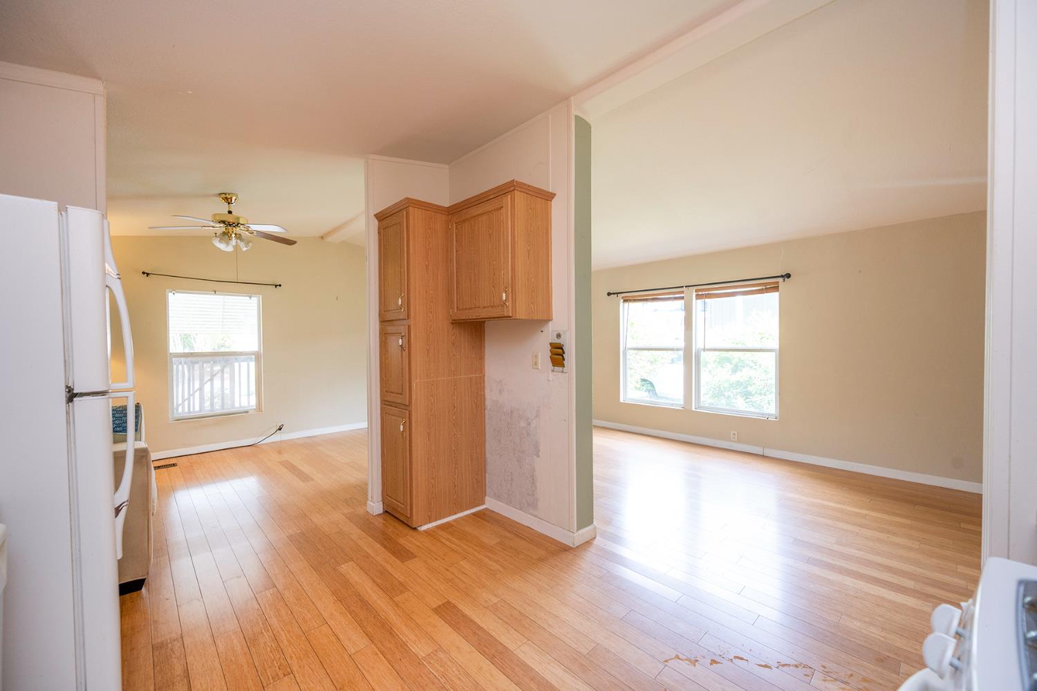 132 Danielle Way Folsom, CA 95630 - Photo 26 of 52 a view of an empty room with wooden floor and a window