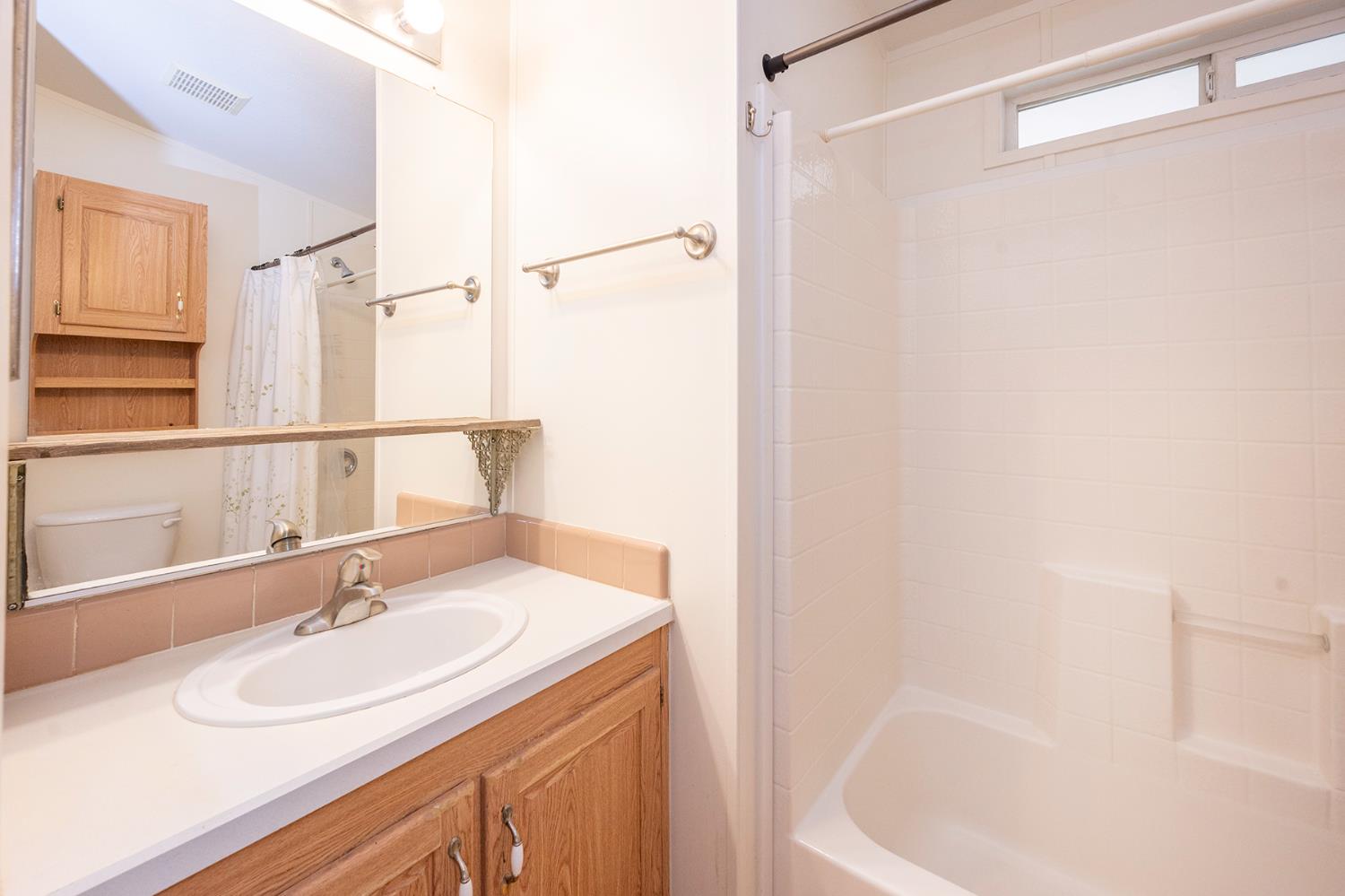 132 Danielle Way Folsom, CA 95630 - Photo 30 of 52 a bathroom with a sink and a mirror