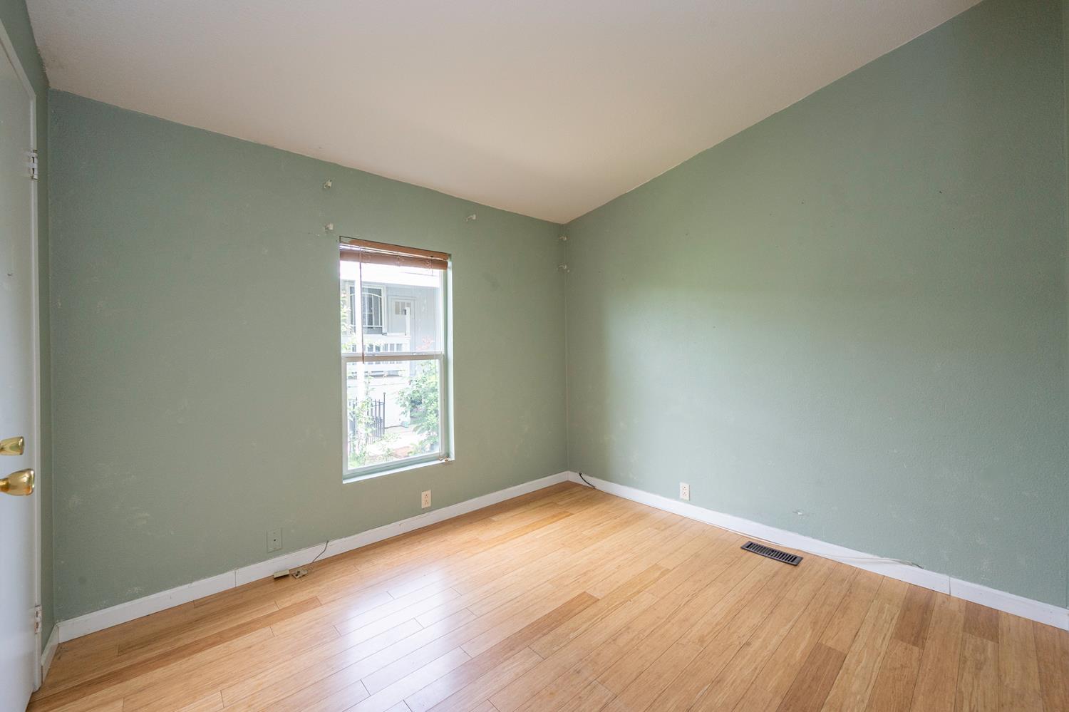 132 Danielle Way Folsom, CA 95630 - Photo 31 of 52 an empty room with wooden floor and windows