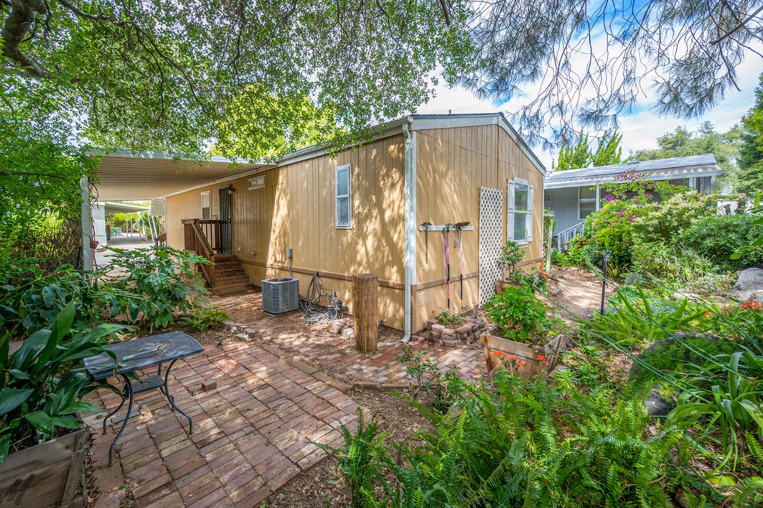 132 Danielle Way Folsom, CA 95630 - Photo 8 of 52 a view of a house with backyard and garden