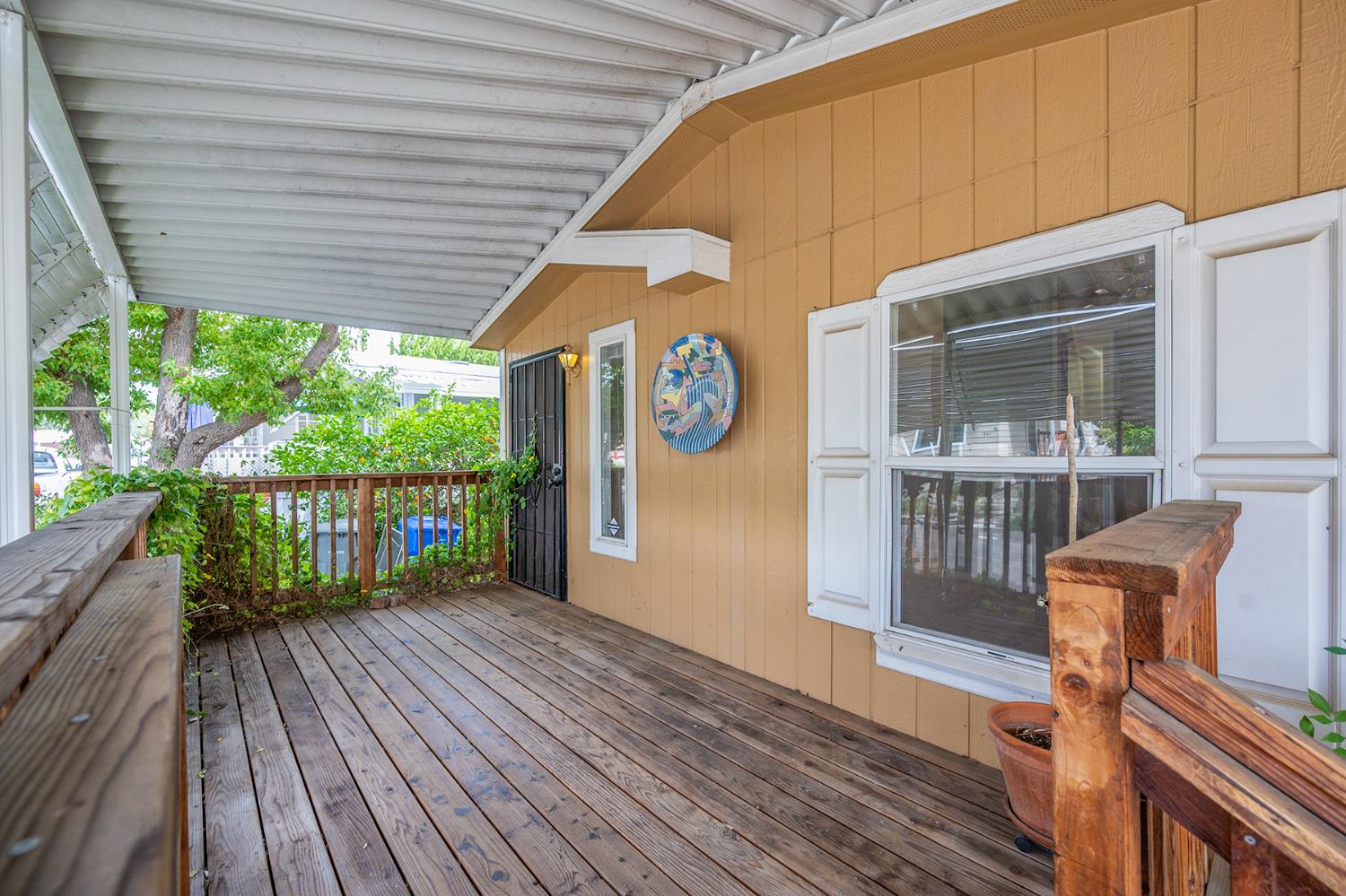 132 Danielle Way Folsom, CA 95630 - Photo 9 of 52 a balcony with wooden floor and outdoor space