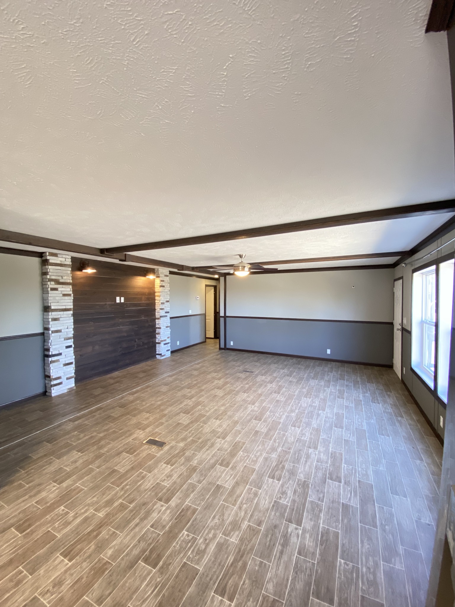 371 Cortner Road Normandy, TN 37360 - Photo 16 of 36 a view of room with wooden floor and windows