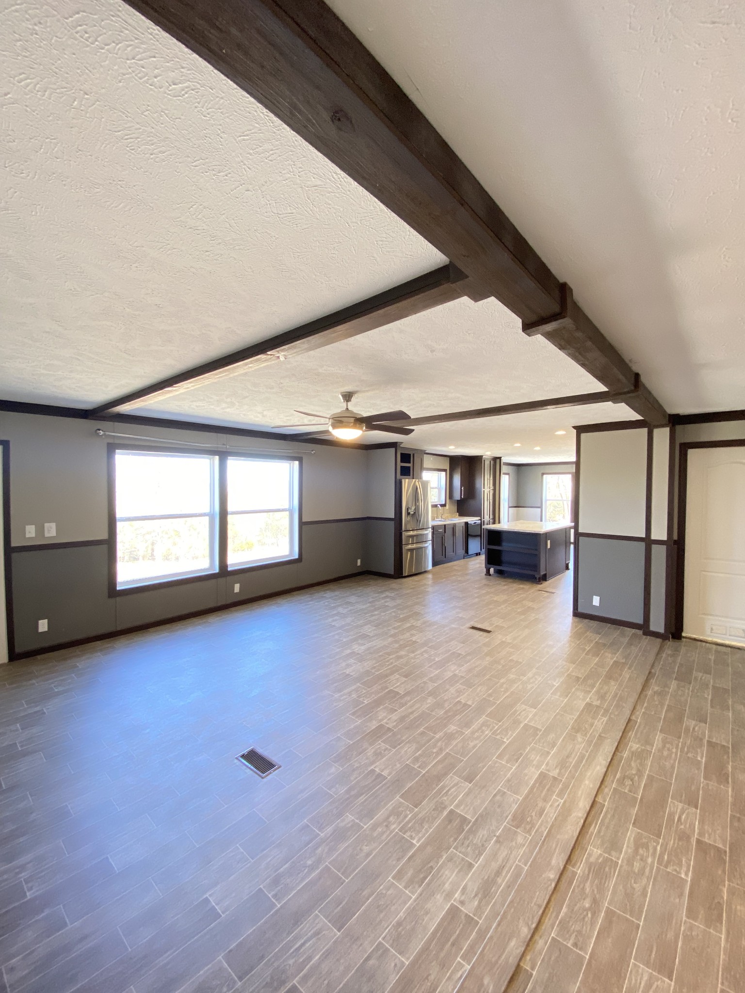 371 Cortner Road Normandy, TN 37360 - Photo 18 of 36 a view of empty room with wooden floor and fan