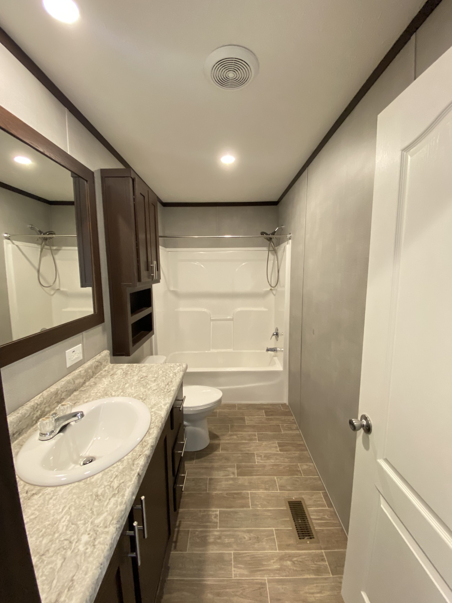 371 Cortner Road Normandy, TN 37360 - Photo 21 of 36 a bathroom with a sink and a mirror