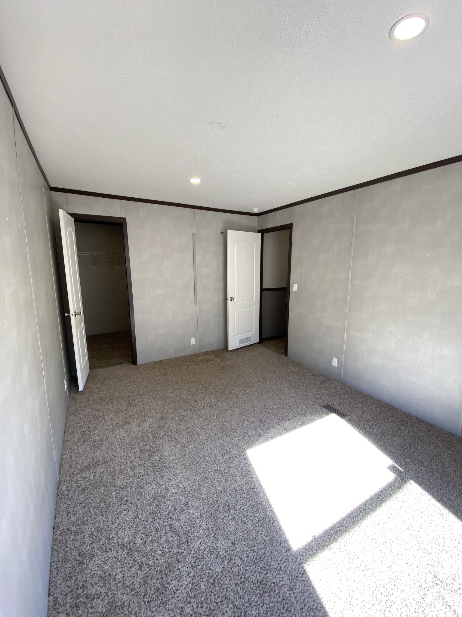 371 Cortner Road Normandy, TN 37360 - Photo 22 of 36 a view of an empty room with wooden floor and a window