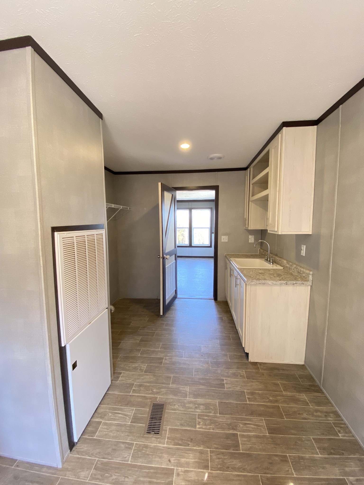371 Cortner Road Normandy, TN 37360 - Photo 6 of 36 a view of a hallway with stairs and a window