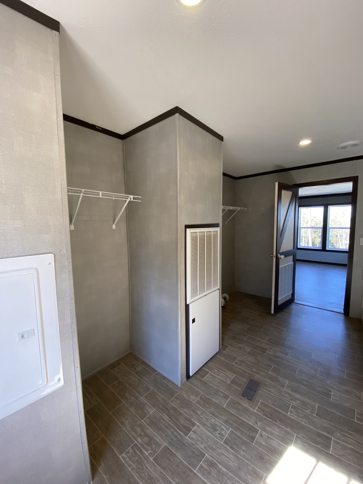 371 Cortner Road Normandy, TN 37360 - Photo 7 of 36 an empty room with wooden floor and windows