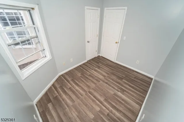 a kitchen with stainless steel appliances a stove a sink and a refrigerator