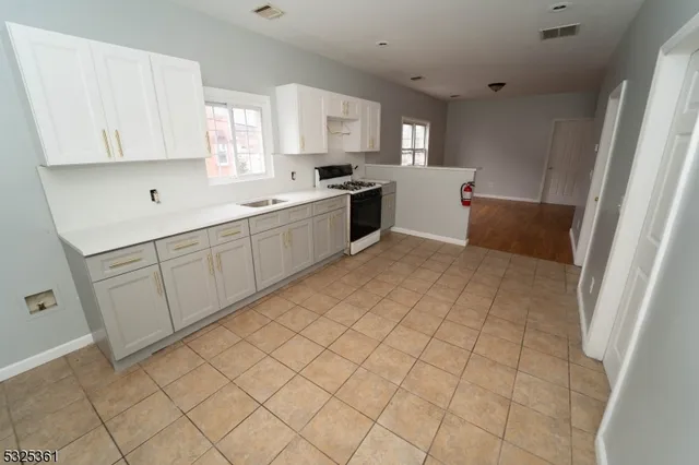 a view of a kitchen from a window
