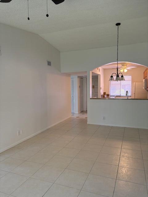21938 Remsen Terrace, Unit 209 Boca Raton, FL 33433 - Photo 15 of 20 a view of a kitchen with a ceiling fan and kitchen view