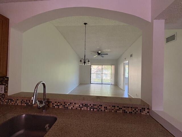 21938 Remsen Terrace, Unit 209 Boca Raton, FL 33433 - Photo 4 of 20 a view of a kitchen with a sink and window