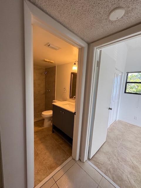 21938 Remsen Terrace, Unit 209 Boca Raton, FL 33433 - Photo 7 of 20 a view of a bathroom from the hallway