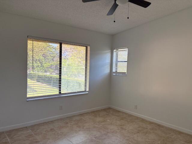 21938 Remsen Terrace, Unit 209 Boca Raton, FL 33433 - Photo 10 of 20 an empty room with a window