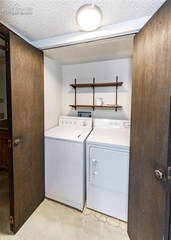 1034 Fontmore Road, Unit D Colorado Springs, CO 80904 - Photo 28 of 43 a utility room with dryer and washer