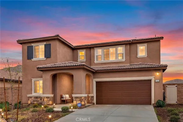 front view of a house with yard