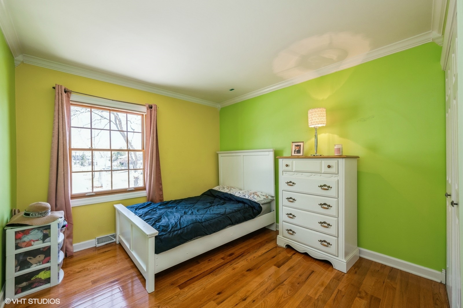 4130 North Firestone Drive Hoffman Estates, IL 60192 - Photo 13 of 27 a bedroom with a bed and two windows
